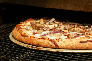 Pizza baking in the commercial oven