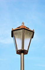 Street light against a blue sky background