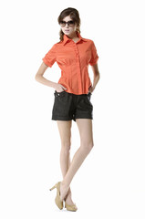 Fototapeta premium Young woman standing against on white background