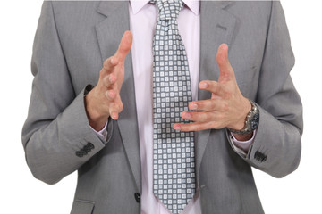 Businessman gesturing with his hands