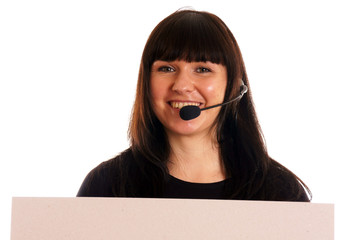 Young woman with headset and empty advertising sign