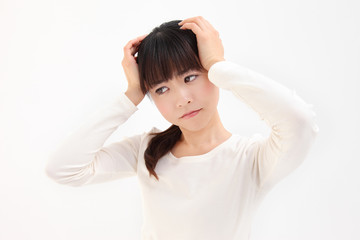 Naklejka premium 頭を抱える女性