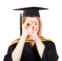 funny female graduate looking through her certificate