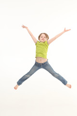 Fototapeta na wymiar Girl jumping isolated on white background