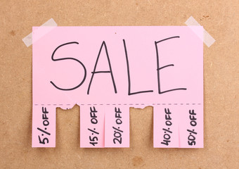 Color advertisement sale on wooden background