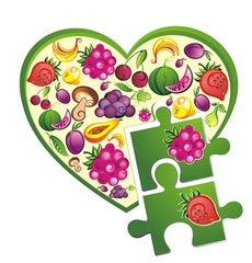Fresh fruit heart with  puzzles of  strawberry and raspberry