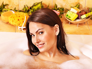 Woman take bubble  bath.