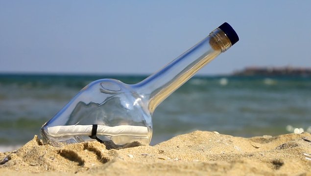 Message in a bottle on the beach