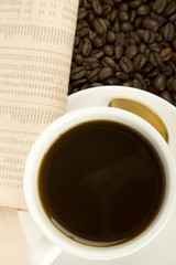 Caffeine Drink & Newspaper