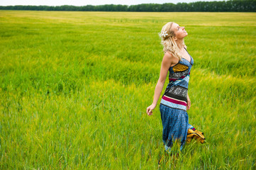 Fototapeta premium Candid carefree adorable woman in field
