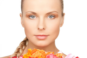 Fototapeta premium lovely woman with red flowers
