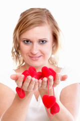 Heart symbol in woman hands isolated