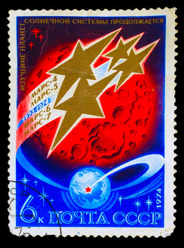 USSR- CIRCA 1974: A stamp printed in USSR, planet Mars and earth