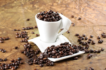 Coffee beans in a cup