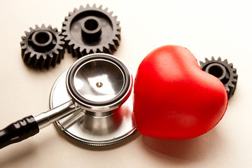 Mechanical ratchets, stethoscope and red heart