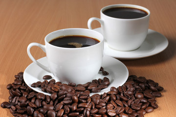 Beans and two white cup