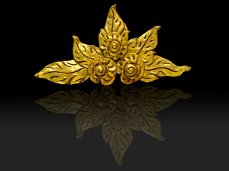 The golden flowers carved in black