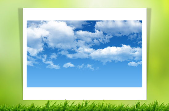 green grass and blue sky on white paper