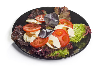 Soft cheese with tomatoes and vegetables