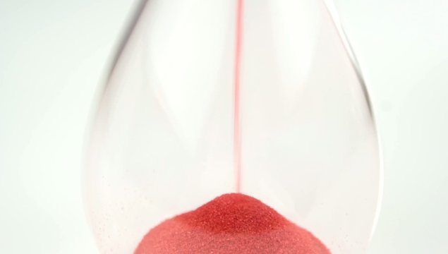 Hourglass with red sand
