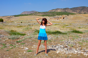 Naklejka premium Young woman in Pamukkale, Turkey