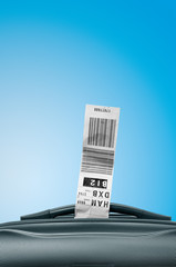 Luggage tag with suitcase