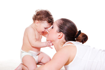 Mother playing with baby