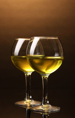Wineglass on brown background