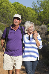 mature modern hikers on vacation