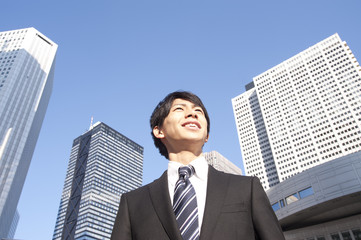 A building and a young businessman