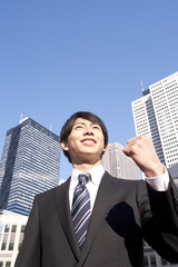 A building and a young businessman