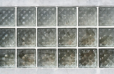 The pattern of block glass on the wall