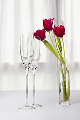 Champagne glasses with tulips