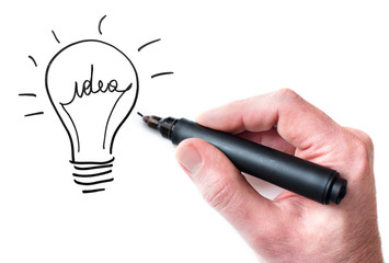 Hand drawing Idea bulb on whiteboard