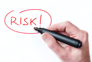 Hand writing Risk on whiteboard