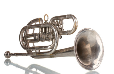 old trumpet isolated on white