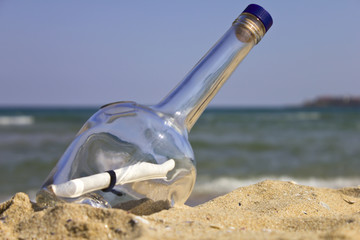 Message in a bottle on the beach