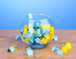 Pieces of paper for lottery in vase