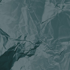 grey crumpled paper texture or background