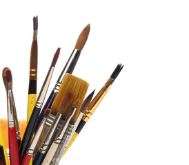 Fototapeta premium Group of brushes over white