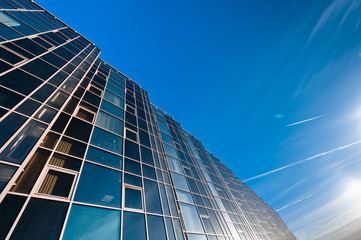 Fototapeta na wymiar Glass wall of office building