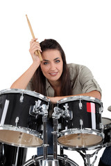 Fototapeta na wymiar Female drummer