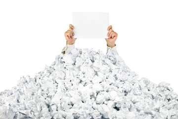 Person under crumpled pile of papers with a blank page / isolate - obrazy, fototapety, plakaty