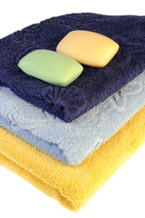 soap and towels on a white background