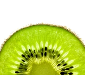 Fototapete Obstscheiben Scheibe einer frischen Kiwi / Super Macro / Gegenlicht