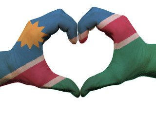 Heart and love gesture in namibia flag colors by hands isolated