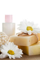 Obraz na płótnie Canvas Natural cosmetics concept: soap and hand cream for hands