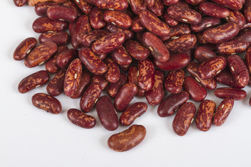 A handful of red beans. View from above. Isolated on white backg