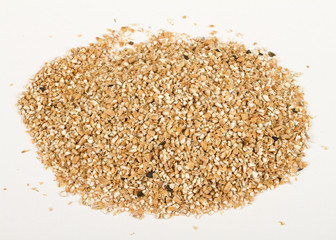 Pearl barley heap isolated on white