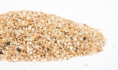 Pearl barley heap isolated on white